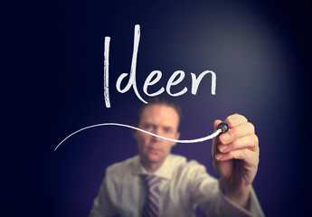 A businessman writing a Idea 