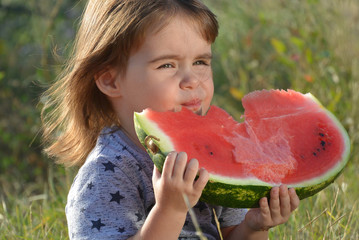 little girl and watermelon