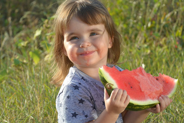 little girl and watermelon