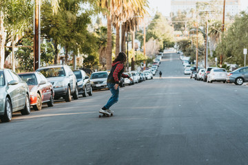 Man skates down the street