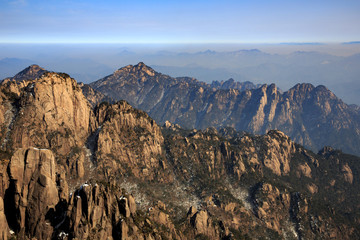 Obraz premium Huangshan China National Park - Anhui Province, Chinese Mountain Peak. Sea of Fog, Yellow Granite Mountains with Canyon, Exotic Pine Trees and Forest, Jagged Cliffs, UNESCO World Heritage Site