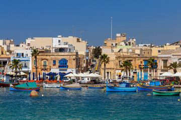 Fototapeta premium Malta. Marsaxlokk. Traditional fishing boats.