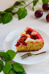 Slice of plum cake on a plate