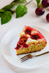 Slice of plum cake on a plate