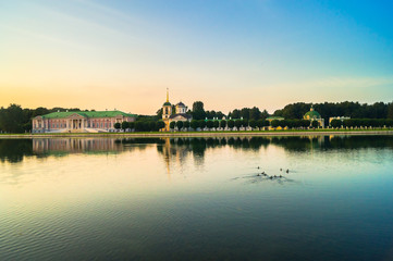 Evening serenity of the palace pond, included into ensemble of the State reserve museum Kuskovo, former aristocratic summer country estate of the russian nobility of the 18th century. Moscow. Russia.