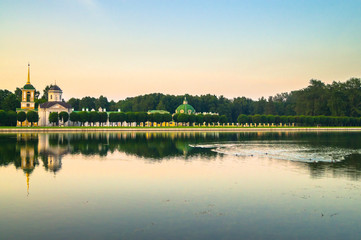 Evening serenity. Fragment of the State reserve museum Kuskovo with palace pond, former aristocratic summer country estate of the russian nobility of the 18th century. Moscow. Russia.