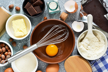Ingredients for cooking Brownie. A classic American dessert. Cooking process pie.