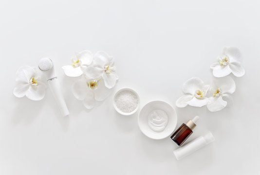 Spa background with facial massage gadget