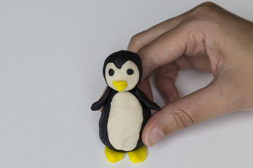 step by step making penguin with play dough for children's activity. school,nursery or kindergarten lesson plasticine concept.