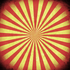 A square box with red and yellow stripes converging and forming a circle. Aged old retro vintage texture.
