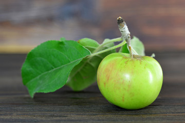 Apple on wooden background