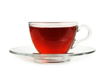 Tea in transparent cup isolated on white background