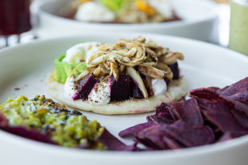 Tortilla with avocado, fresh cheese, beetroot and oyster mushrooms