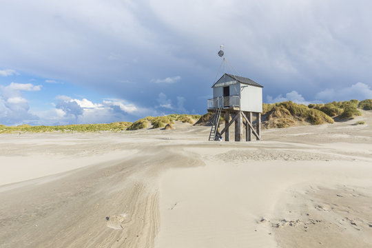 Shelter cabin on beach of Terschelling, Netherlands. Refuge for stranded castaways, in Dutch called 'drenkelingenhuisje'.