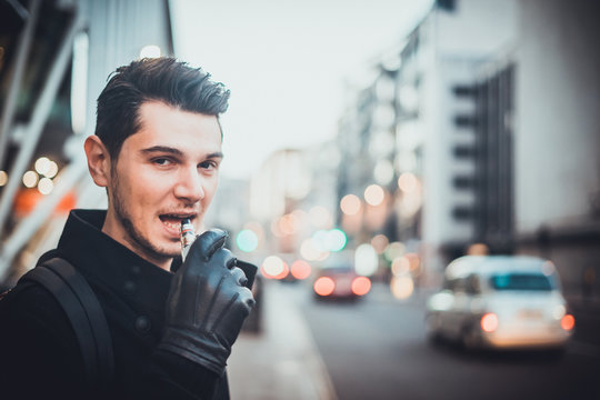 Man vaping on the street