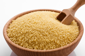 fresh couscous on a white acrylic background