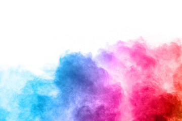 abstract powder splatted background. Colorful powder explosion on white background. Colored cloud....