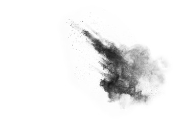 particles of charcoal on white background,abstract powder splatted on white background,Freeze...