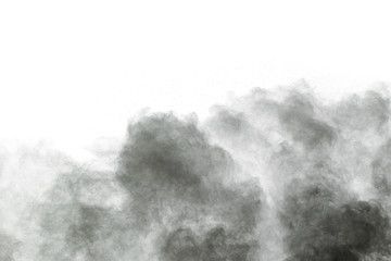 particles of charcoal on white background,abstract powder splatted on white background,Freeze motion of black powder exploding or throwing black powder.