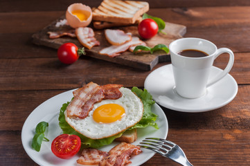 Fried egg and coffee on table