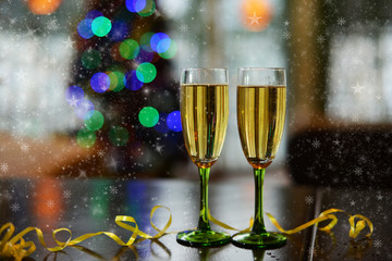 beautiful glasses of two with a drink of champagne bubbles