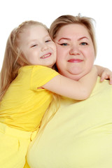 Mom and little daughter plus the size of the model, gently embra