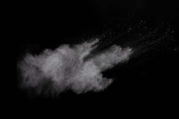 White powder explosion on white background. Colored cloud. Colorful dust explode. Paint Holi.