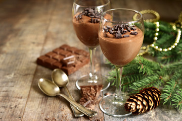 Homemade festive (christmas) chocolate mousse in a glass.