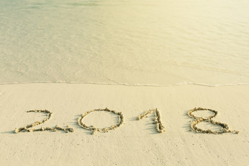 numbers 2018 on  tropical sandy beach
