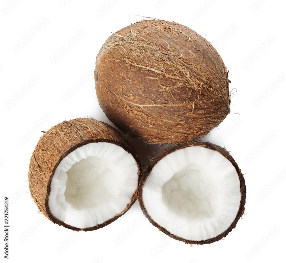 Wall mural top view of ripe coconut fruits isolated on white background