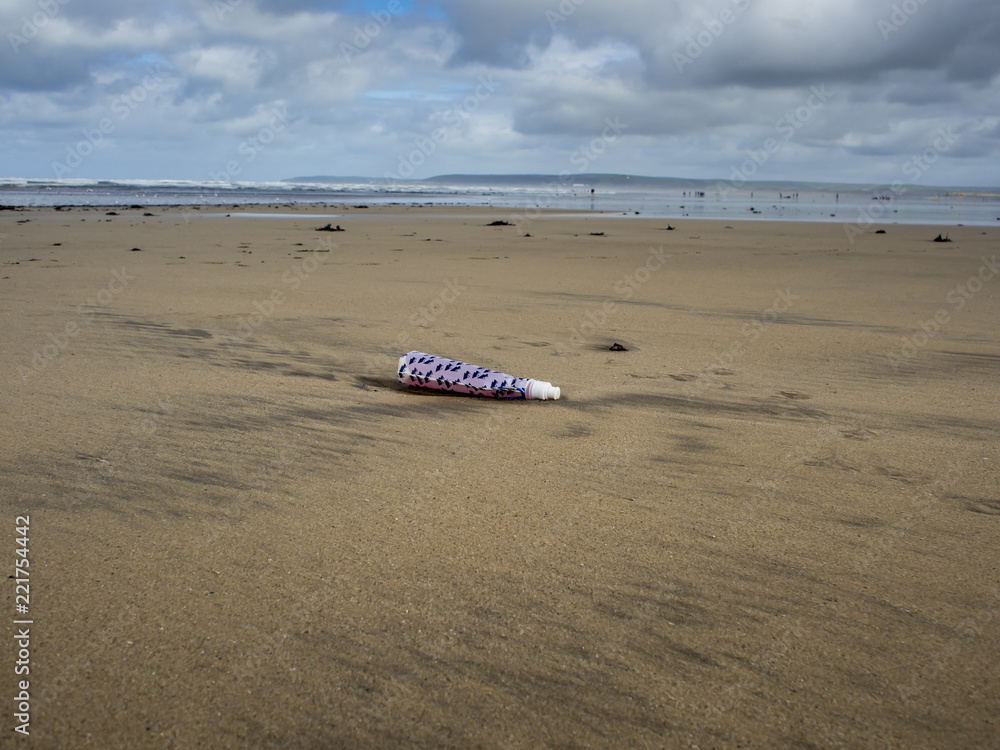 Wall mural bottle on the beach