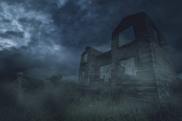 Abandoned house near the scary grave