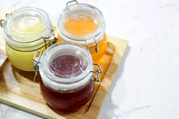homemade jam and butter in jars for breakfast