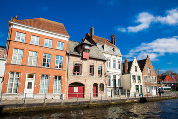 Naklejka na ściany i meble Canals of the historical and beautiful Bruges town in Belgium