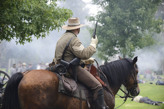 Confederate soldier riding a horse