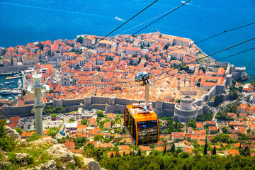 Old town of Dubrovnik with cable car ascending Srd mountain, Dalmatia, Croatia