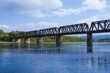 Railroad Tresstle Spanning Mighty River In United States