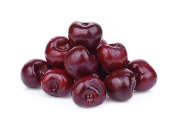 pile of cherry fruit isolated on white background
