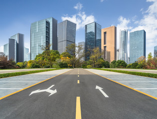 empty asphalt road through modern city in China.