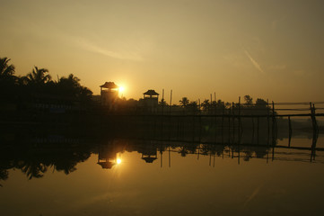 old rural wooden bridge at dawn. a wooden bridge is located near the old Portuguese fort in Goa. India