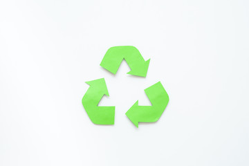 Ecology concept. recycle symbol. Green arrows on white background top view copy space