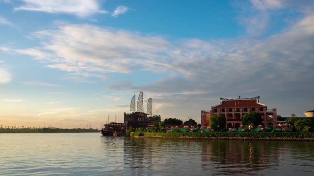 Timelapse landscape sunrise to the morning of Dragon Wharf or Ho Chi Minh Museum, Vietnam. Royalty high-quality free stock footage time lapse of original commercial port, historical in dawn sky