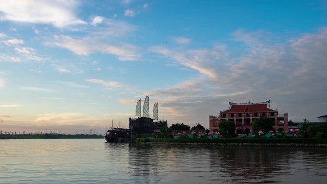 Timelapse landscape sunrise to the morning of Dragon Wharf or Ho Chi Minh Museum, Vietnam. Royalty high-quality free stock footage time lapse of original commercial port, historical in dawn sky