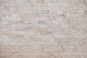 Stone brick wall texture, stone brick wall background, stone brick wall for interior or exterior design with copy space for text or image, ideal for a background and used in interior design.