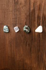 An overhead photo of gemstones, healing stones with copy space