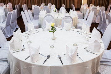 Wedding in the style rustic. Decoration of the table with flowers and cutlery. Composition from flowers.