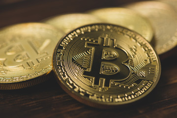 Bitcoin on wood background