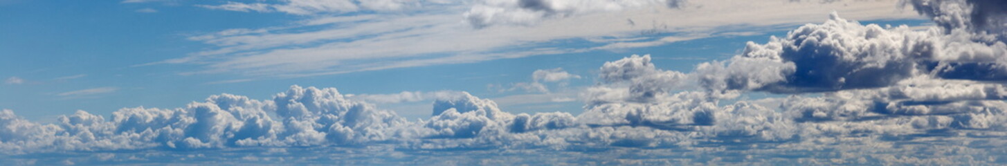 Stormy dark clouds and blue rainy sky