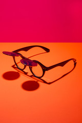 Sunglasses with double glass on a colored background