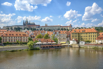 Fototapeta na wymiar The Castle of Praha on the hill Hradschin in the Czech Republic in summer.